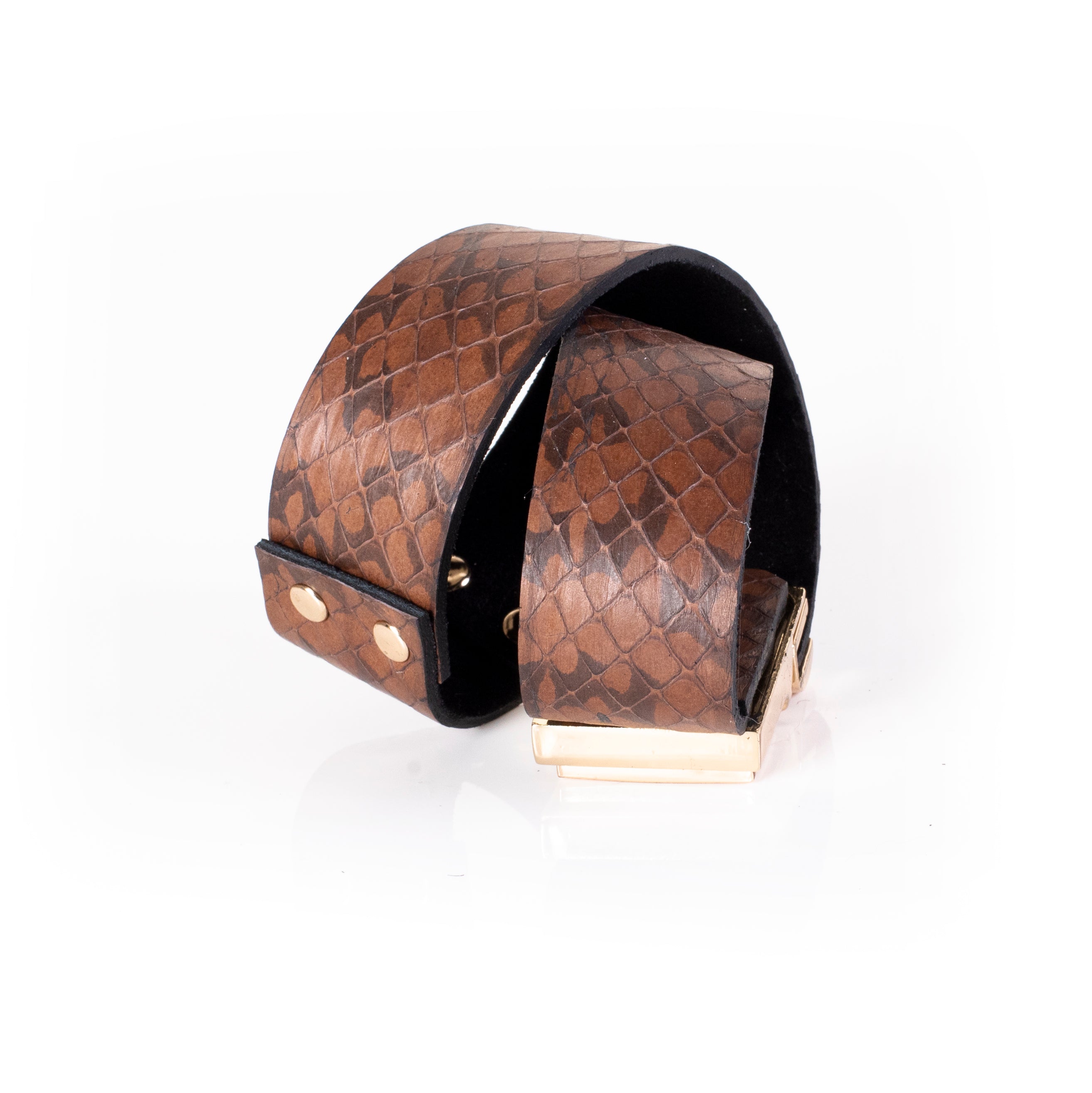 Brown textured leather cuff bracelet with wrap design and gold clasp, wide sculptural statement bracelet for women