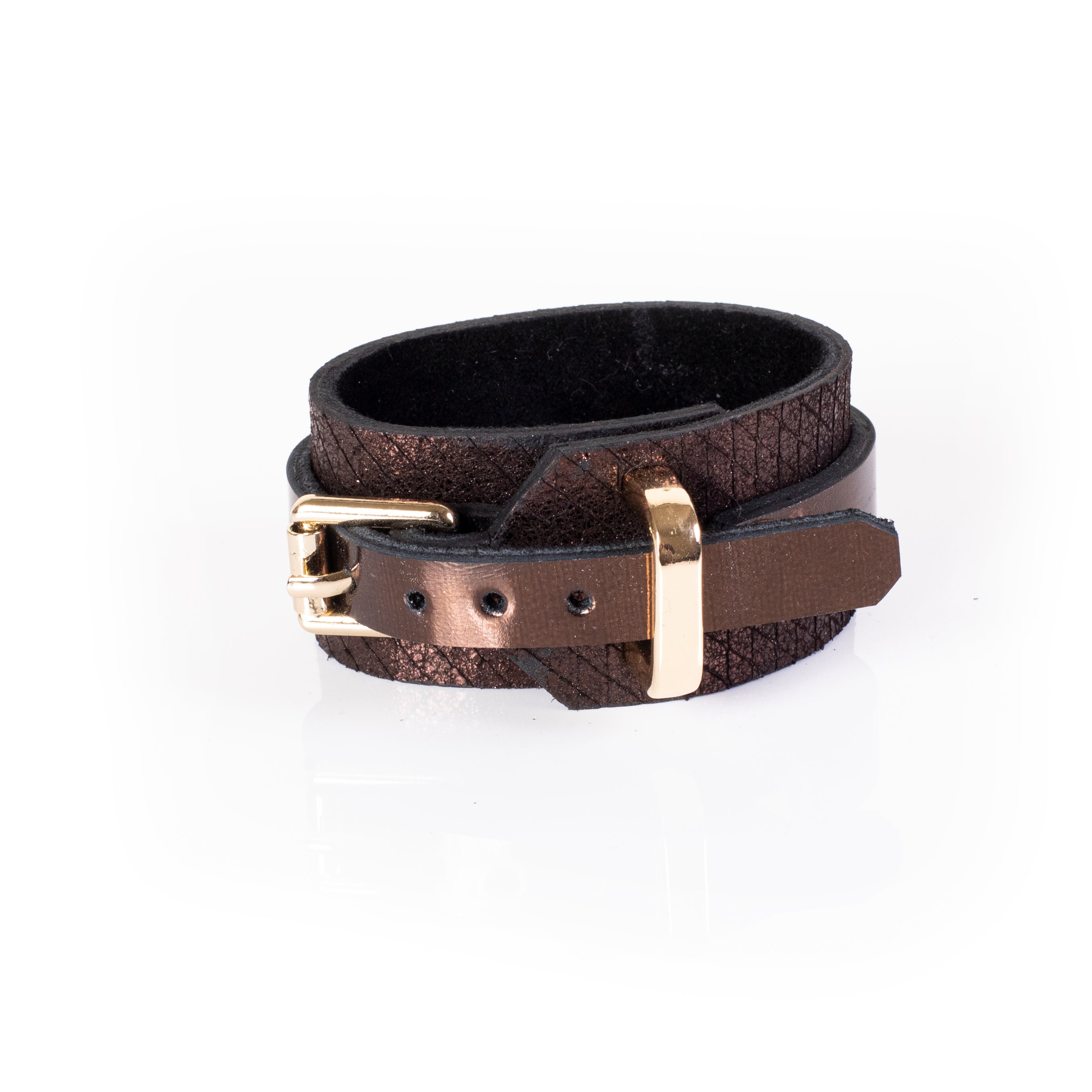 brown leather cuff bracelet with gold buckle closure and metallic bronze textured finish wide statement design