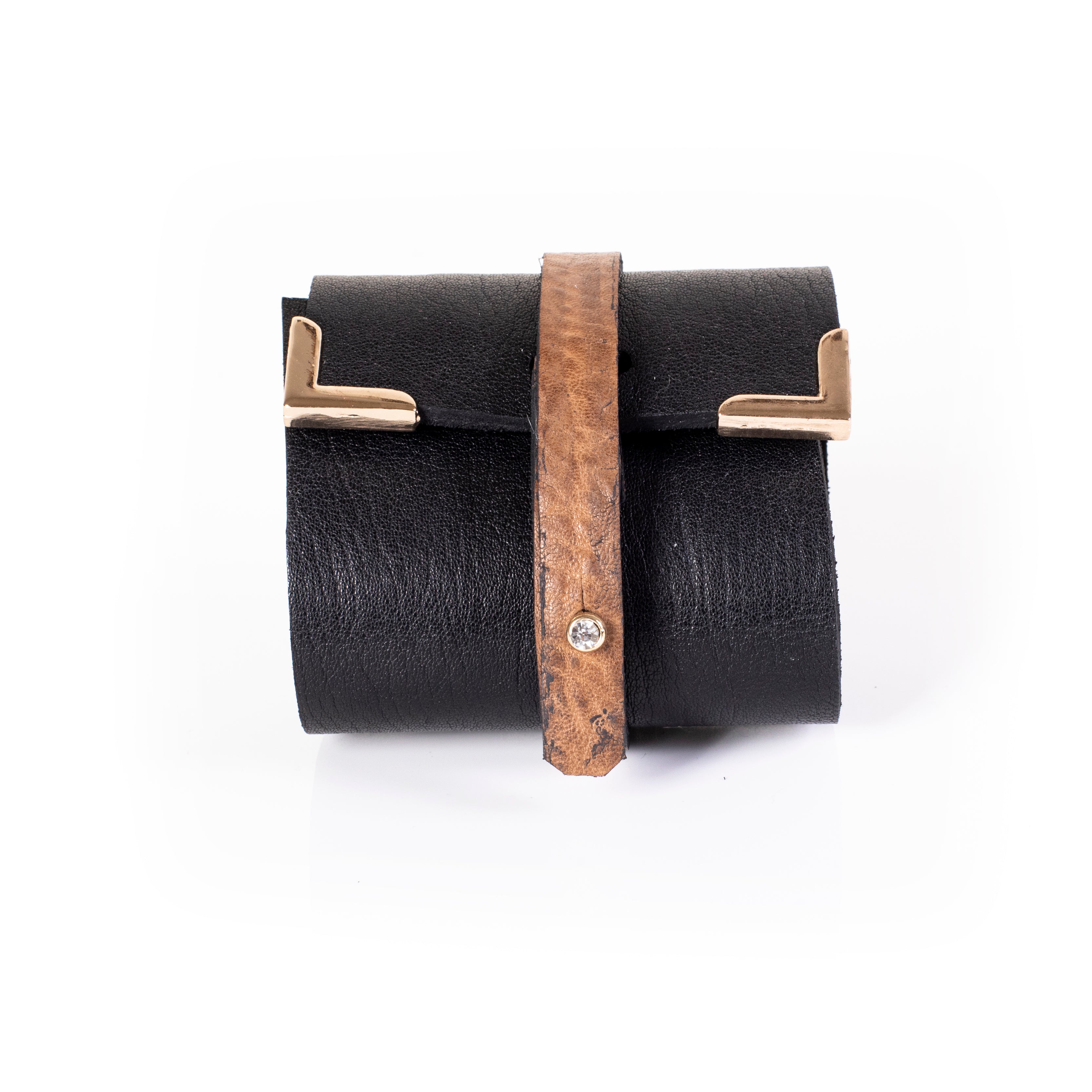 Black leather cuff bracelet with brown strap and gold corner hardware, wide minimalist statement bracelet for women