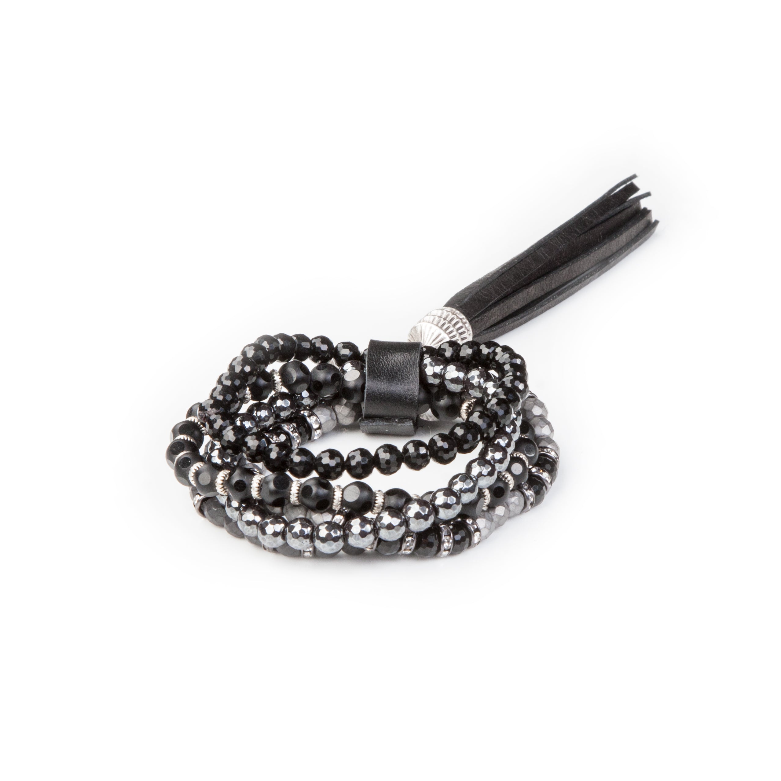 Women’s black layered crystal wrap bracelet with smoky gray bead accents, silver details, and oversized black leather tassel on white background